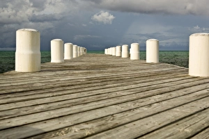 Afternnon light and dark clouds on dock in Blue Hills, Provodenciales, Turks and Caicos Afternnon light and dark clouds on dock in Blue Hills, Provodenciales, Turks and Caicos