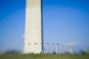 American flags surround Washington Monument (blurred), Washington D.C American flags surround Washington Monument (blurred), Washington D.C
