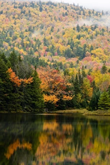 Ammonoosuc Lake in fall in New Hampshires White Mountains. White Mountain National Ammonoosuc Lake in fall in New Hampshires White Mountains. White Mountain National