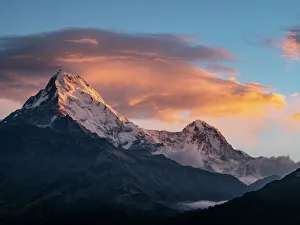 Asia, Nepal. Annapurna South (7,219 Meter) and clouds at sunrise, viewed from Poon Hill Asia, Nepal. Annapurna South (7,219 Meter) and clouds at sunrise, viewed from Poon Hill