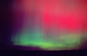 Aurora borealis, northern lights at midnight east of Boise, Idaho following an unusually Aurora borealis, northern lights at midnight east of Boise, Idaho following an unusually