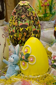 Australia. Easter display of holiday chocolate eggs and blue stuffed Easter Bunny Australia. Easter display of holiday chocolate eggs and blue stuffed Easter Bunny