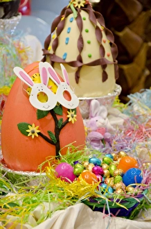 Australia. Easter display of large decorated chocolate eggs and holiday candy Australia. Easter display of large decorated chocolate eggs and holiday candy