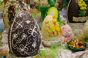 Australia. Easter display of ornately decorated large dark chocolate eggs and candy Australia. Easter display of ornately decorated large dark chocolate eggs and candy