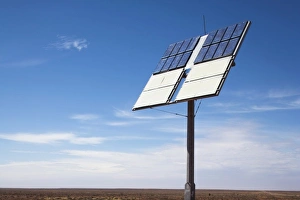 Australia, South Australia, Coober Pedy, Solar panel in outback desert along empty Australia, South Australia, Coober Pedy, Solar panel in outback desert along empty