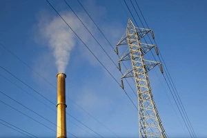 Australia, South Australia, Port Augusta, High tension power lines and smokestack Australia, South Australia, Port Augusta, High tension power lines and smokestack