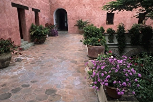 Beautiful colors of Mexico Architecture stucco with flowers and arches in Oaxaca Mexico Beautiful colors of Mexico Architecture stucco with flowers and arches in Oaxaca Mexico