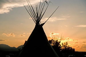 Blackfeet tepees made from canvas stretched over tipi poles at sunset in Browning Montana Blackfeet tepees made from canvas stretched over tipi poles at sunset in Browning Montana