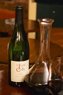 Images Dated 20th December 2004: Bottle on a table with wine glasses and decanter in the wine bar Le Cafe du Passage in Paris
