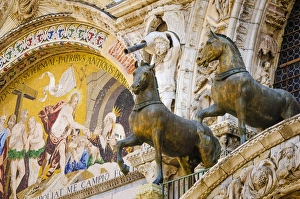 Bronze horses and mosaic above the entrance to Basilica San Marco (Saint Marks Cathedral) Bronze horses and mosaic above the entrance to Basilica San Marco (Saint Marks Cathedral)