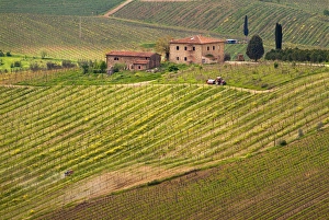 A building on a hill surrounded by vineyards in the countryside betweem Greve A building on a hill surrounded by vineyards in the countryside betweem Greve