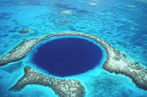 CA, Belize. Aerial view of Blue Hole (diameter 1000 ft.) at Lighthouse reef CA, Belize. Aerial view of Blue Hole (diameter 1000 ft.) at Lighthouse reef