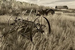 Canada. Black and white of old farm machinery in field Canada. Black and white of old farm machinery in field