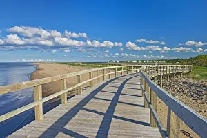 Canada, New Brunswick, Bouctouche. Boardwalk next to ocean Canada, New Brunswick, Bouctouche. Boardwalk next to ocean