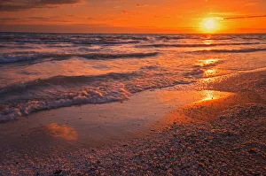 Canada, Ontario, Sandbanks Provincial Park, Waves on Lake Ontario beach at sunset Canada, Ontario, Sandbanks Provincial Park, Waves on Lake Ontario beach at sunset