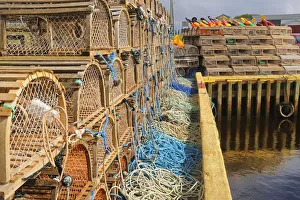 Canada, Prince Edward Island, Seacow Pond. Stacked lobster traps and buoys. Credit as Canada, Prince Edward Island, Seacow Pond. Stacked lobster traps and buoys. Credit as