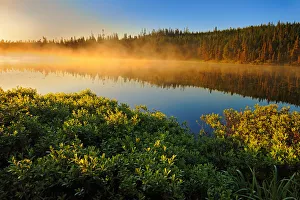Canada, Quebec, Lac A Thompson. Sunrise mist on lake Canada, Quebec, Lac A Thompson. Sunrise mist on lake
