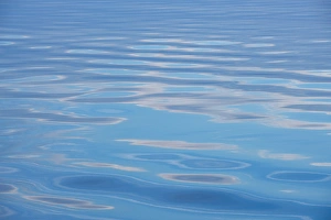 Canada, Quebec, Saguenay, SaguenayaSt. Lawrence Marine Park. Clouds reflected in calm sea Canada, Quebec, Saguenay, SaguenayaSt. Lawrence Marine Park. Clouds reflected in calm sea