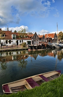Canal with boats in small town of Edam, the Netherlands Canal with boats in small town of Edam, the Netherlands