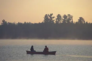 Canoeing. Umbagog Lake. Mist. Northern Forest. Errol, NH Canoeing. Umbagog Lake. Mist. Northern Forest. Errol, NH