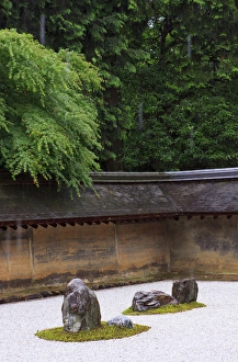 The carefully placed rocks and raked gravel gardens of the Zen garden of Ryoan-Ji Temple The carefully placed rocks and raked gravel gardens of the Zen garden of Ryoan-Ji Temple