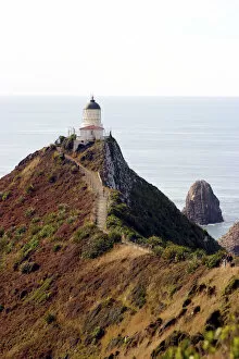 Images Dated 27th February 2004: Catlins, Otago, Nugget Point, New Zealand. A lighthouse in the deep southern region of the Catlins