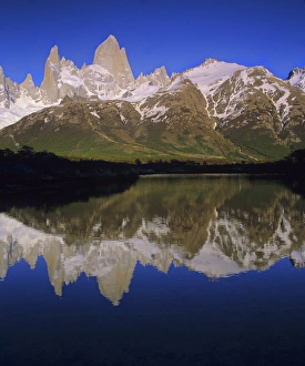 Cerro Fitzroy at sunrise with reflection in pothole lake, Los Glaciares National park Cerro Fitzroy at sunrise with reflection in pothole lake, Los Glaciares National park