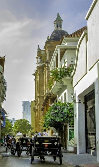 Charming horse-drawn carriages take visitors for tours of historic Cartagena, Colombia Charming horse-drawn carriages take visitors for tours of historic Cartagena, Colombia