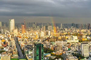 Cityscape of Tokyo at sunset with a rainbow as viewed from Shibuya Scramble Square in Cityscape of Tokyo at sunset with a rainbow as viewed from Shibuya Scramble Square in
