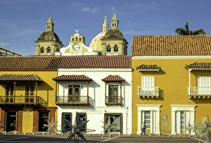 Colorful buildings and church domes in the Plaza de la Aduana, Old City, Cuidad Vieja Colorful buildings and church domes in the Plaza de la Aduana, Old City, Cuidad Vieja