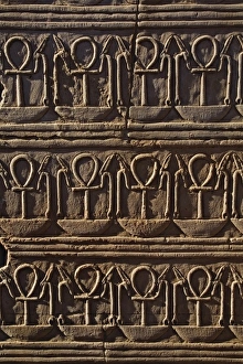 Coptic Christian symbol in Egyptian hieroglyphs, The Temple of Kom-Ombo, near Aswan, Egypt Coptic Christian symbol in Egyptian hieroglyphs, The Temple of Kom-Ombo, near Aswan, Egypt