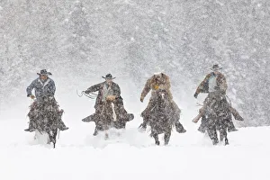 Cowboys during winter roundup, Kalispell, Montana Cowboys during winter roundup, Kalispell, Montana