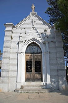 Cres, Coatia - Low angle view of old world church. Vertical shot Cres, Coatia - Low angle view of old world church. Vertical shot