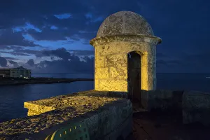 Cuba, Havana. Golden light illumines stone turret of old fort Cuba, Havana. Golden light illumines stone turret of old fort