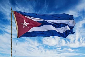 Cuba, Havana Vieja, Cuban flag waving in the breeze Cuba, Havana Vieja, Cuban flag waving in the breeze