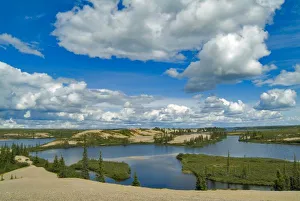 Cumulus clouds float above lakes, Northwest Territories, Canada Cumulus clouds float above lakes, Northwest Territories, Canada