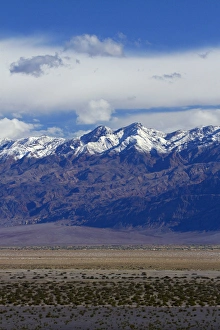 Death Valley near Stovepipe Wells, and snow on Grapevine Mountains, Death Valley National Park Death Valley near Stovepipe Wells, and snow on Grapevine Mountains, Death Valley National Park