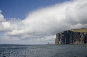Denmark, Faroe Islands, North Atlantic. Island of Streymoy, rugged cliffs of Vestmanna Denmark, Faroe Islands, North Atlantic. Island of Streymoy, rugged cliffs of Vestmanna