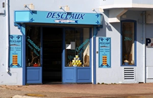 Desclaux Anchois anchovies factory and shop, house painted with advertising in blue and white Desclaux Anchois anchovies factory and shop, house painted with advertising in blue and white
