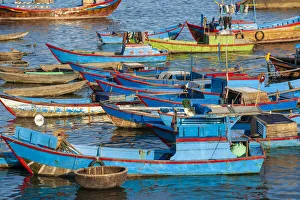 Distinctive red and blue fishing fleet in major fishing port of Nha Trang Distinctive red and blue fishing fleet in major fishing port of Nha Trang