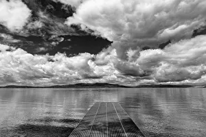Dock reaches out into Skidoo Bay in Flathead Lake near Polson, Montana, USA Dock reaches out into Skidoo Bay in Flathead Lake near Polson, Montana, USA