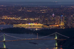 Dusk view of Lions Gate Bridge and Canada Center cityscape from Cypress Road in Vancouver Dusk view of Lions Gate Bridge and Canada Center cityscape from Cypress Road in Vancouver