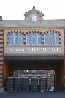 The entrance to the winery at Champagne Henriot with empty champagne bottles, Reims The entrance to the winery at Champagne Henriot with empty champagne bottles, Reims