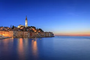 Europe, Croatia, Rovinj. Ocean view of town at sunset Europe, Croatia, Rovinj. Ocean view of town at sunset