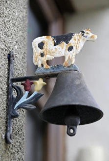 Europe, France, Loire. Doorbell with cow design, Ecluse 28 Argenvieres, Rue Saint-Martin Europe, France, Loire. Doorbell with cow design, Ecluse 28 Argenvieres, Rue Saint-Martin