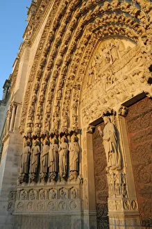 Europe, France, Paris. Door arches with carved saints, Notre Dame Cathedral Europe, France, Paris. Door arches with carved saints, Notre Dame Cathedral