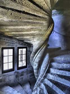 Europe, France, Provence, Lourmarin. Spiral staircase in the Chateau de Lourmarin Europe, France, Provence, Lourmarin. Spiral staircase in the Chateau de Lourmarin