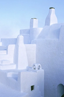 Europe, Greece, Island of Santorini. Chimneys of medieval homes with traditional Europe, Greece, Island of Santorini. Chimneys of medieval homes with traditional
