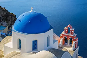 Europe, Greece, Oia. Greek Orthodox church and ocean Europe, Greece, Oia. Greek Orthodox church and ocean