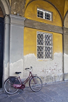 Europe; Italy; Lucca; City Scene of bicycle and Arched Buildings Europe; Italy; Lucca; City Scene of bicycle and Arched Buildings